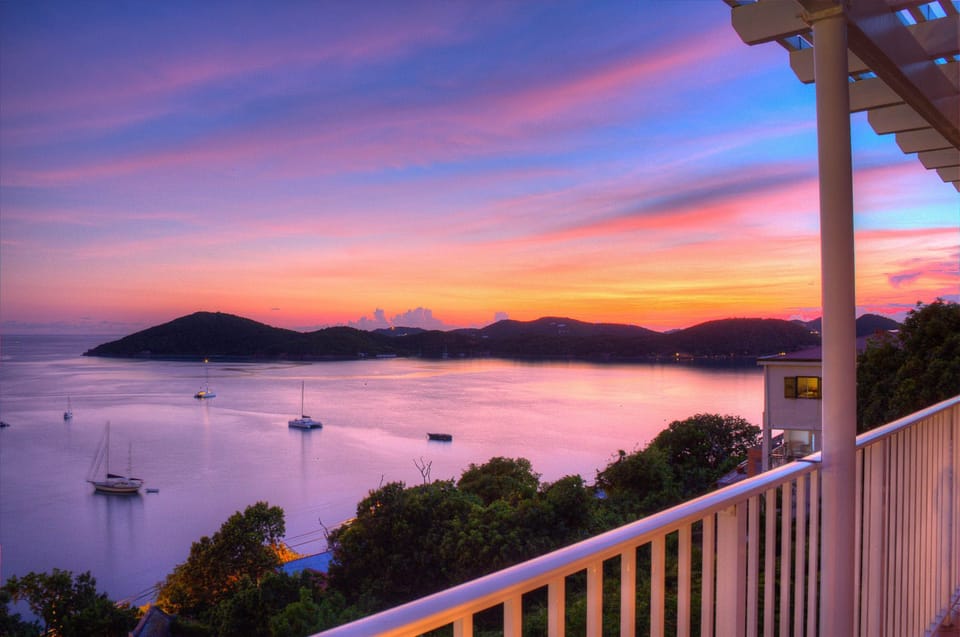 Watch the sun set over the Caribbean from your private balcony retreat.