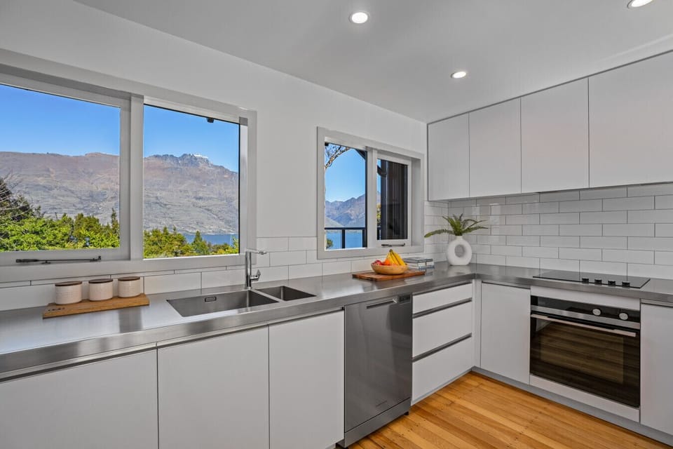 Kitchen: Meal prep made easy with lake views