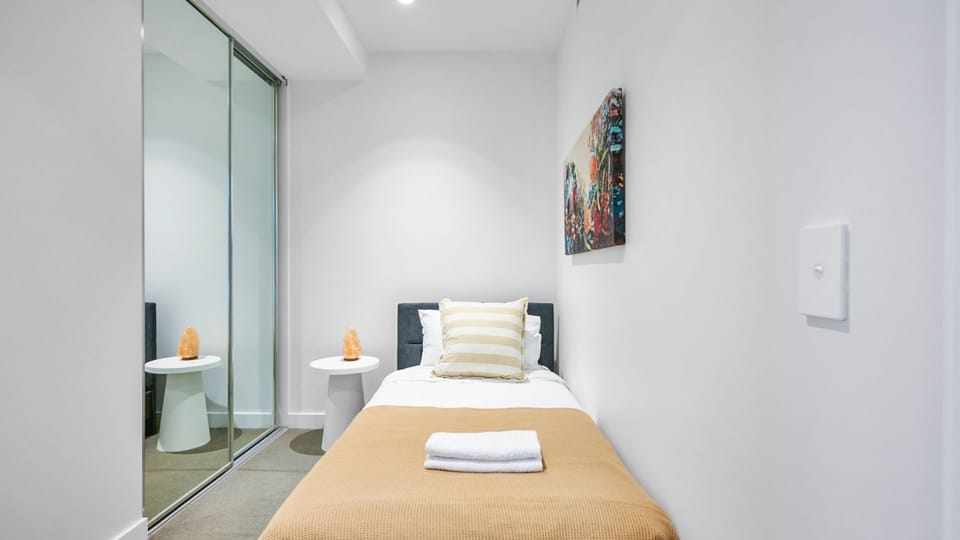 Well-presented single room with fresh linens.