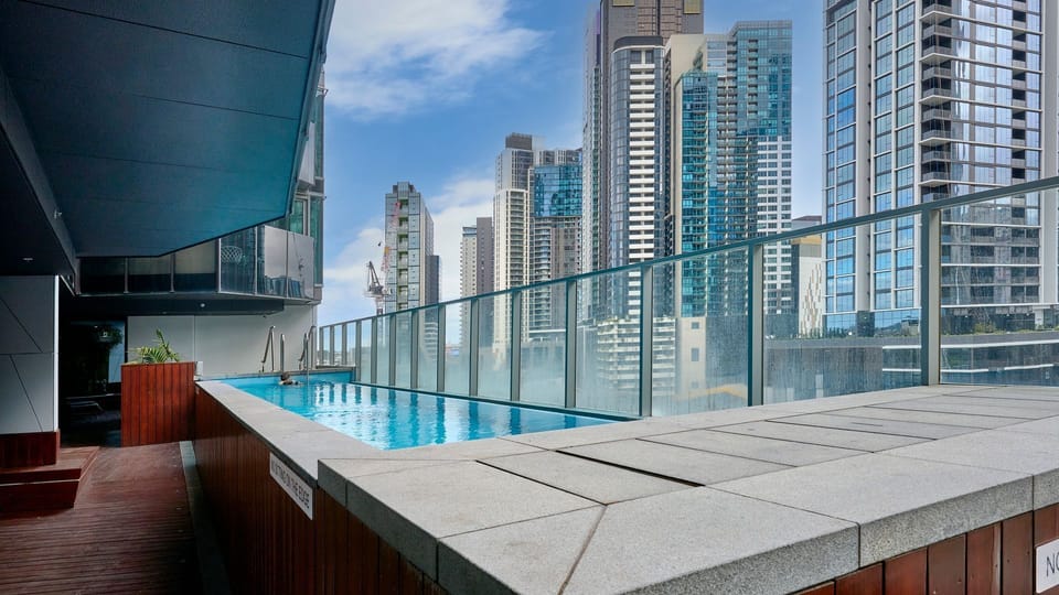 Outdoor pool with stunning high-rise city views.