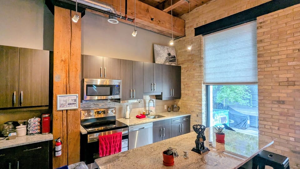 Fully stocked kitchen - utensils, pots, pans, coffee/tea/sugar/spices