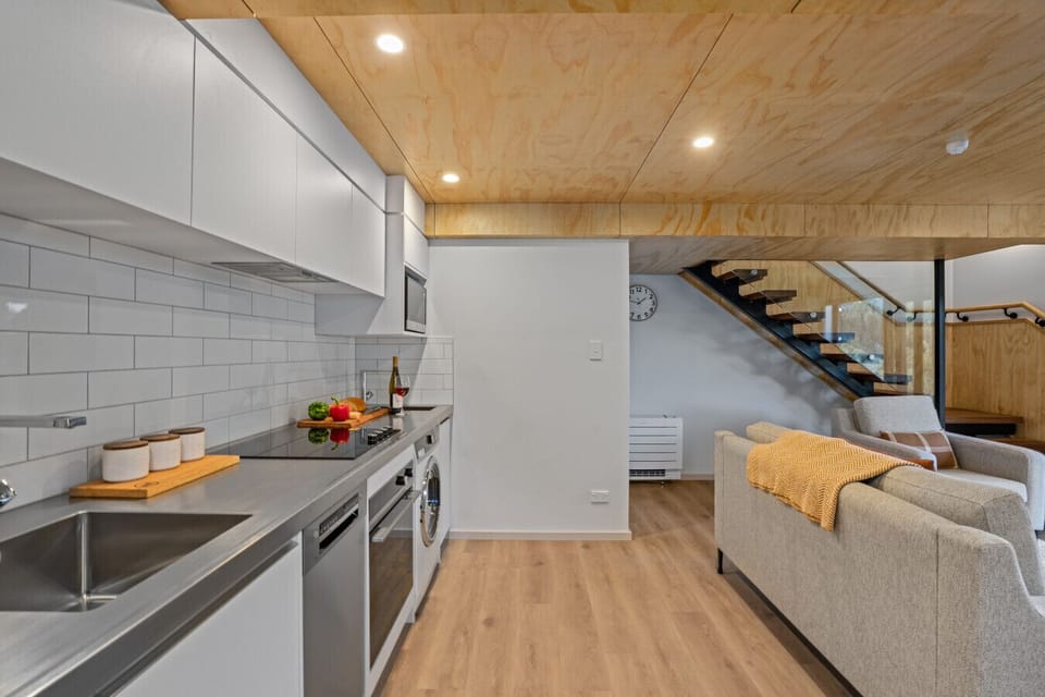 Kitchen: Modern appliances and sleek design invite culinary adventures in style!