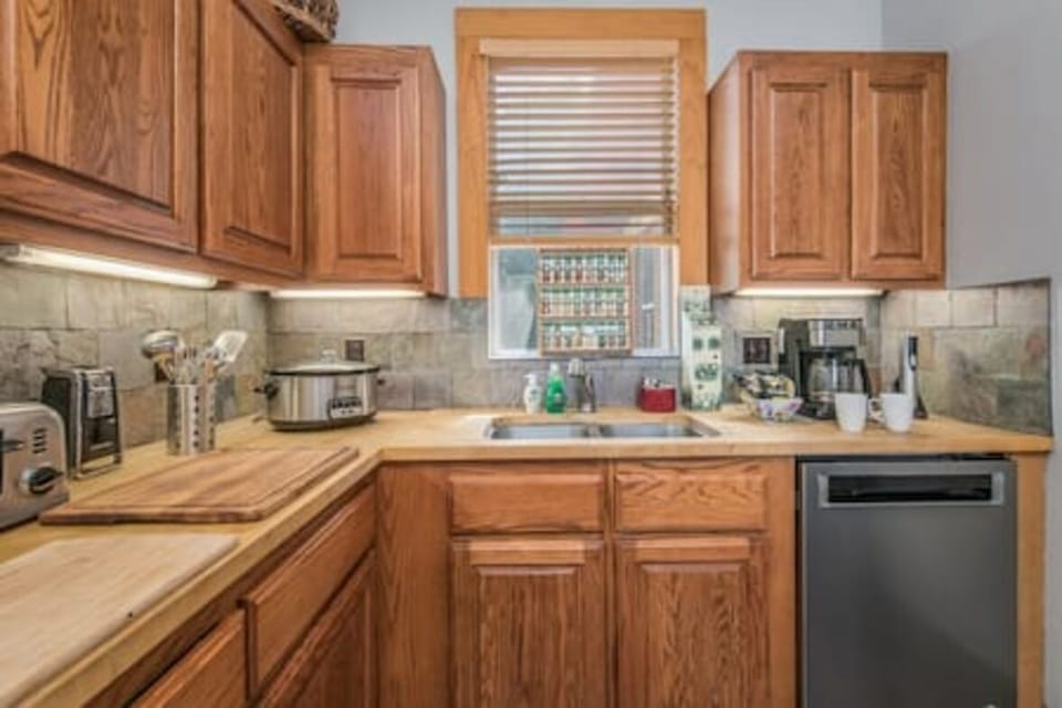 Our kitchen is stocked with spices, coffee pot and coffee, pots and pans, and all cooking utensils.  Bring your favorite ingredients and cook up a fun meal 