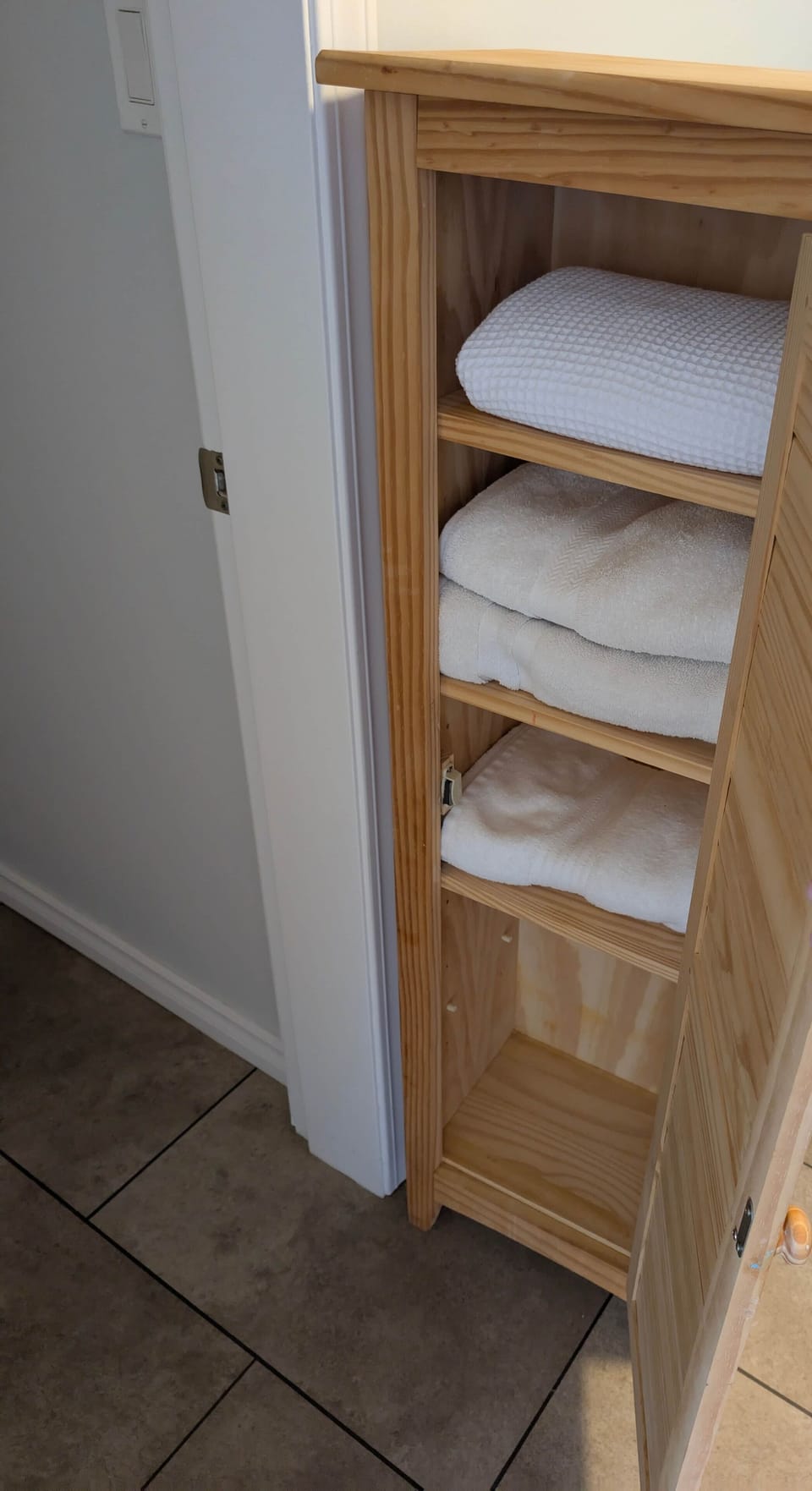 Towel Cupboard - Cedar Suite | Serviced Apartment