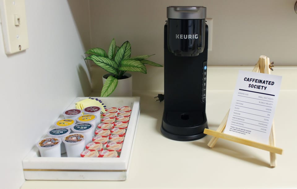 Start your day with our Keurig coffee maker, K-cups and condiments are provided.