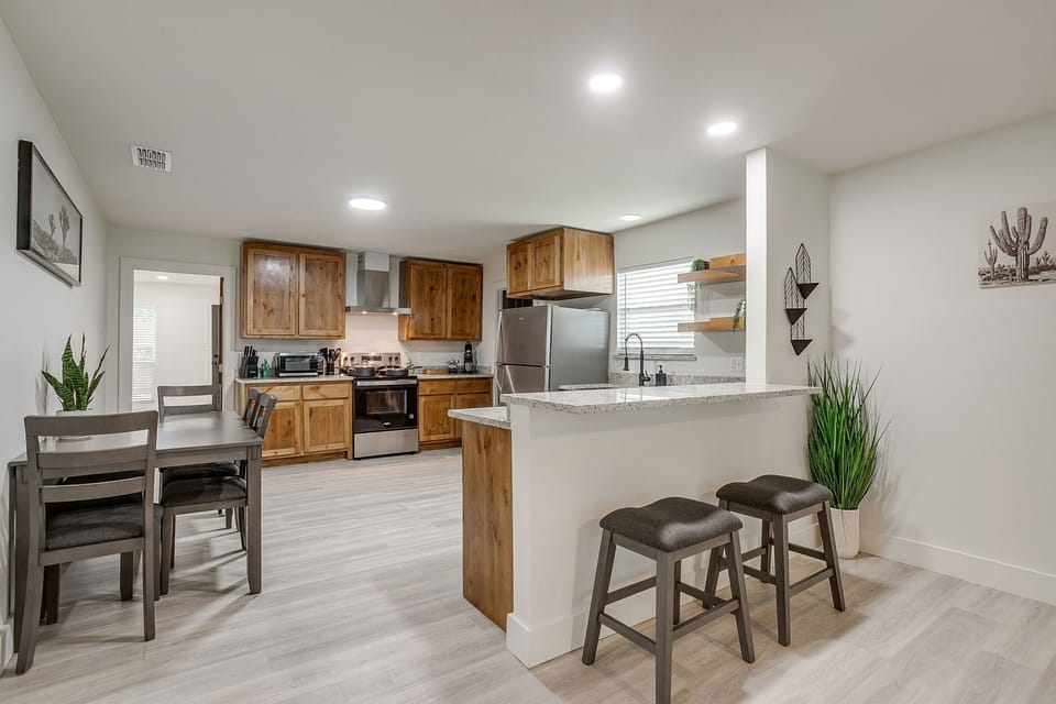 Cook with ease in this newly remodeled kitchen, stocked with everything you need, from pots to plates.