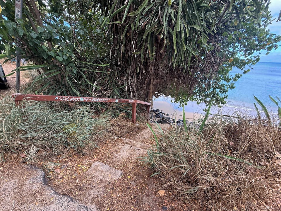 Steps down to the hidden "Secret Beach". From the B&B, walk across the small two-lane "Lower Road" to relax, snorkel (often times alongside honu, Hawaiian Green Sea Turtles) and watch the whales (seasonally).
