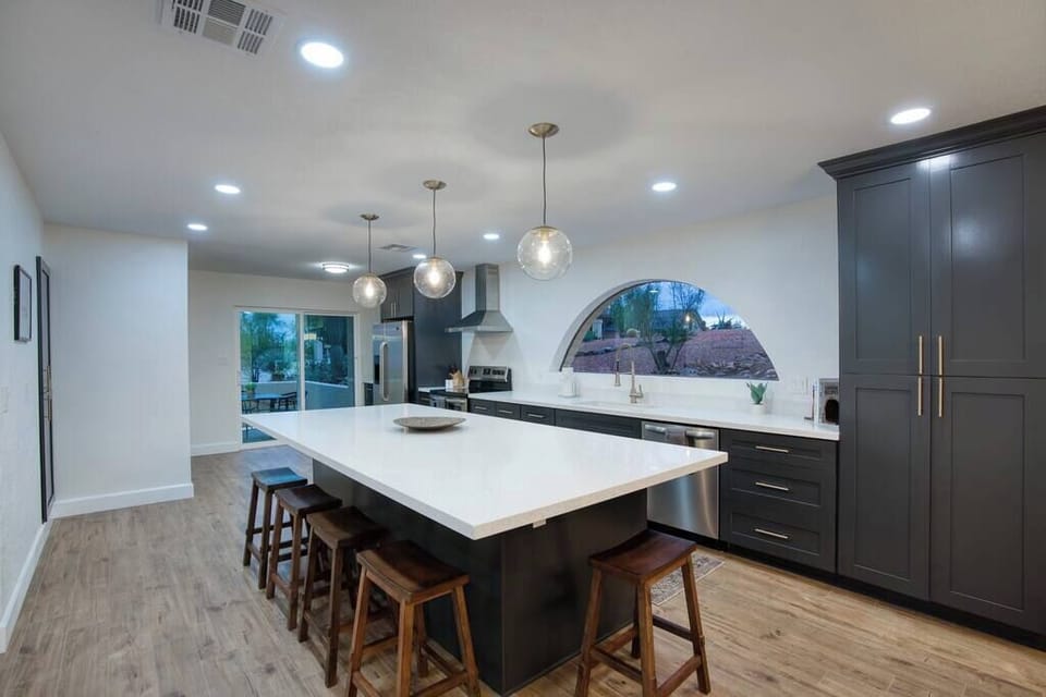 Chef's paradise. Modern kitchen with sleek finishes and ample space for cooking.