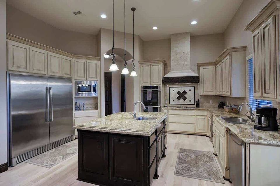Fully equipped kitchen with modern appliances and large island