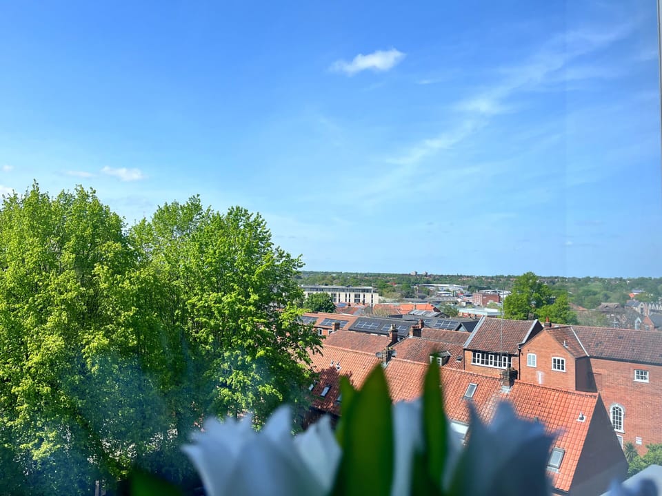 Far-reaching city skyline views of Norwich from the apartment.