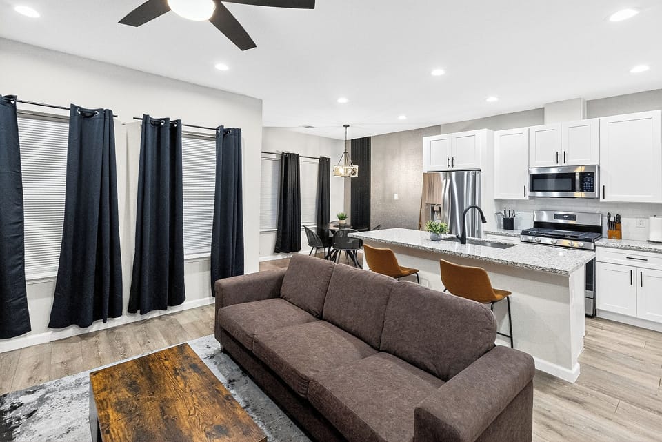 Whether you're looking to catch up on your favorite shows or simply relax and unwind after a long day, this inviting space is the perfect spot to get comfortable.

