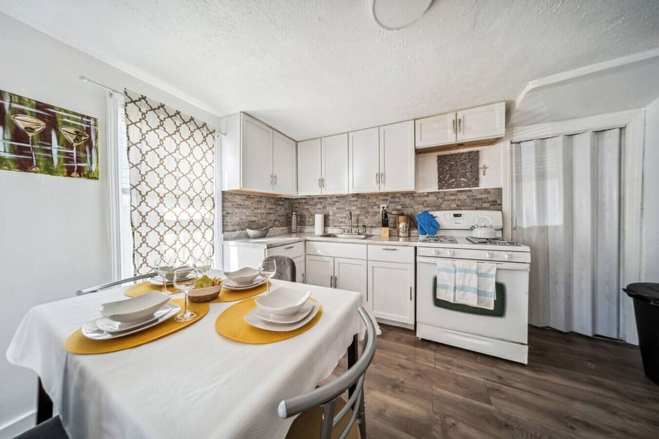 There's a dining area with seating for 4