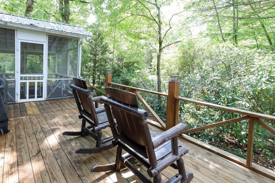 Rock your worries away while overlooking the tranquil forest surroundings.