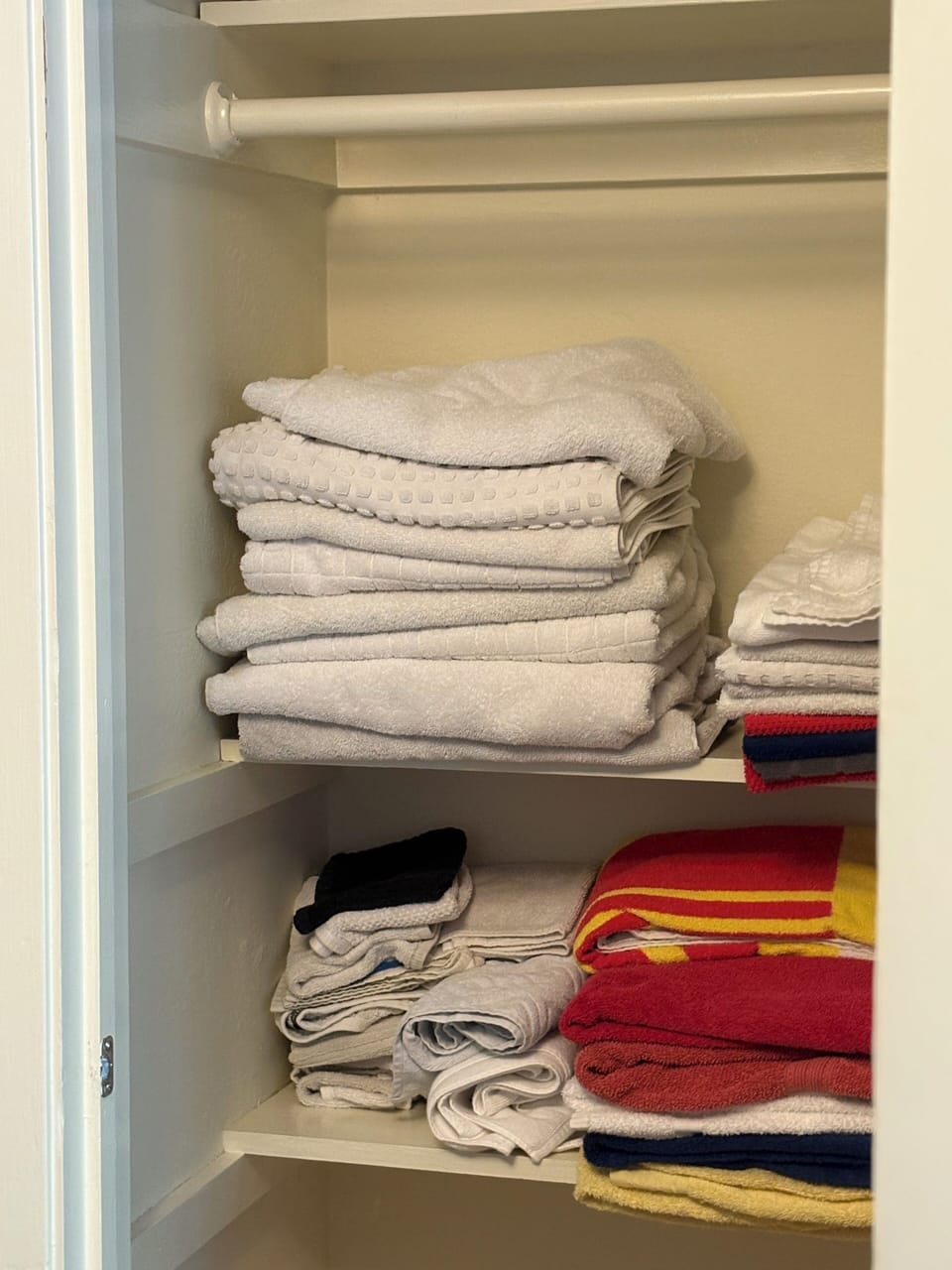 Closet with towels in dining room