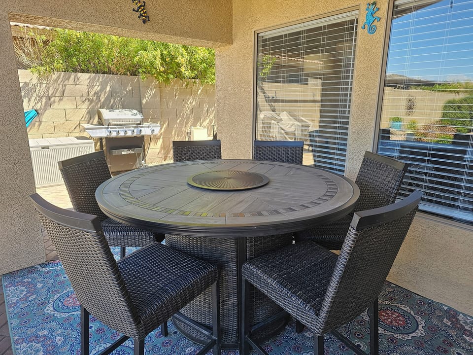 Outdoor dining with fireplace
