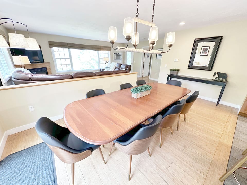 Large dining table with seating for 8 (plus additional folding chairs in closet)