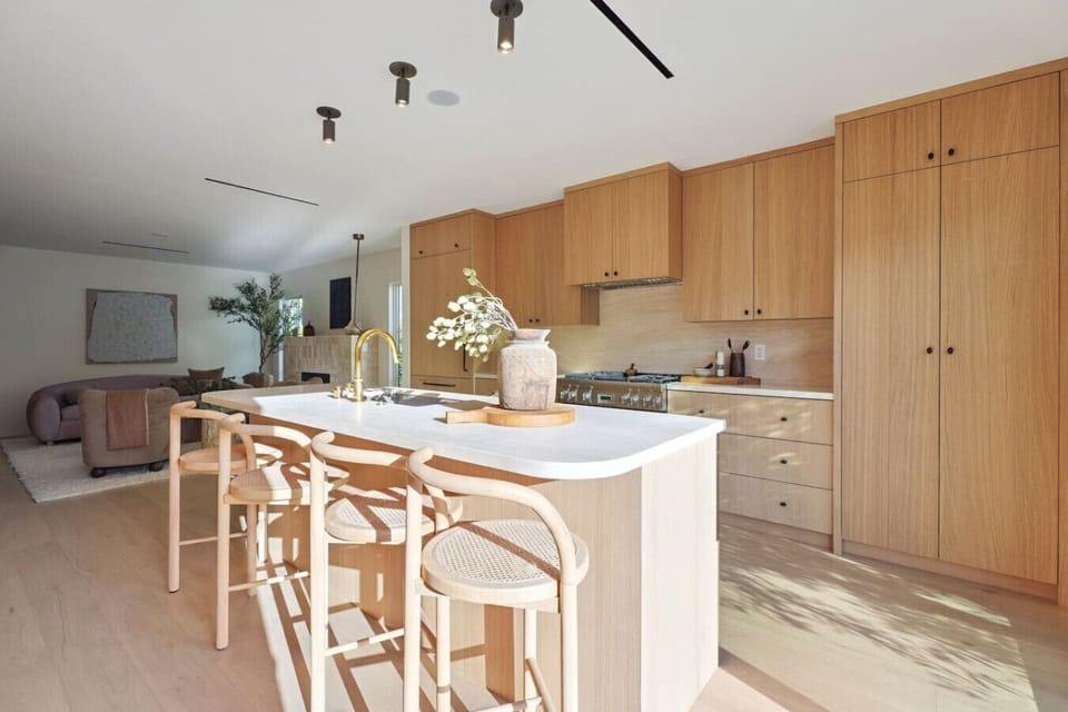 Cook, gather, and create memories in this cozy wooden kitchen.