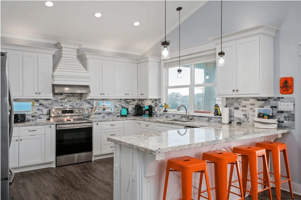 Style meets function in this beach-ready kitchen setup.