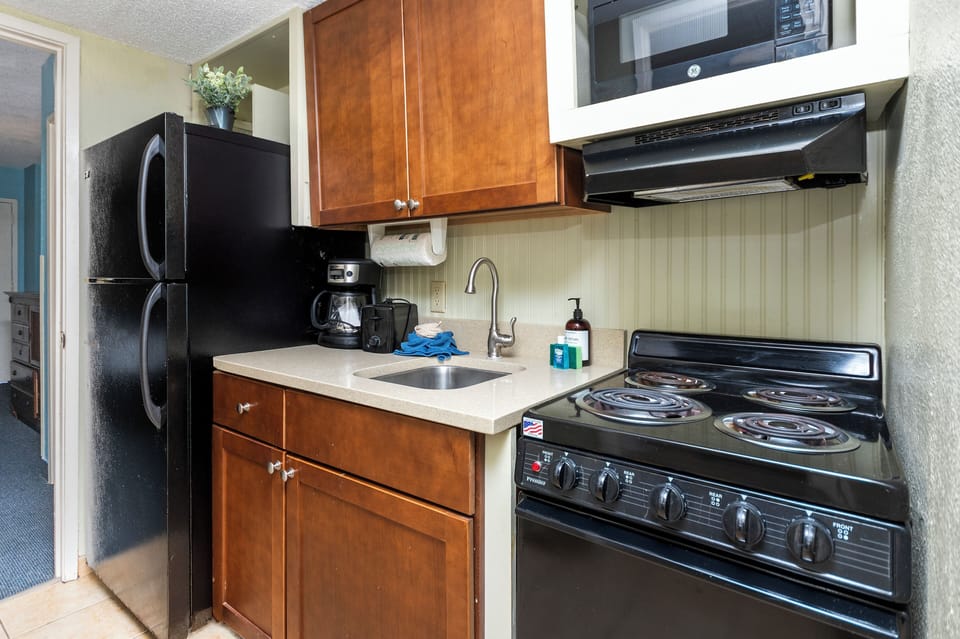 Cooking area fully stocked with everything you need to dine in