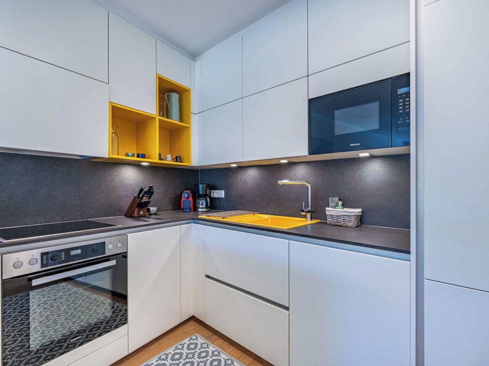 Kitchen, Kitchen Appliance, Major Appliance, Countertop, Cabinetry, Interior Design, Flooring, Kitchen Stove, Floor, Home Appliance