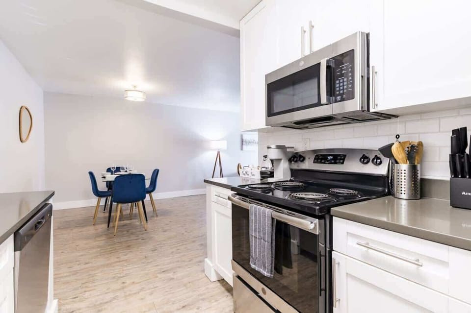 A bright, clean kitchen that flows right into the dining space — perfect for cooking and hanging out with friends