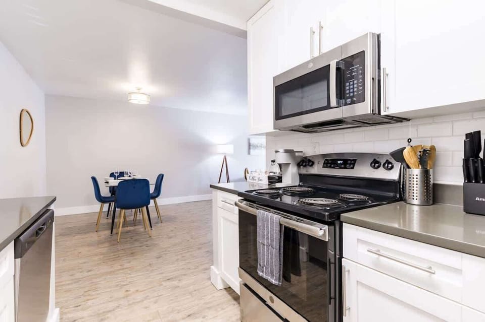 A bright, clean kitchen that flows right into the dining space — perfect for cooking and hanging out with friends