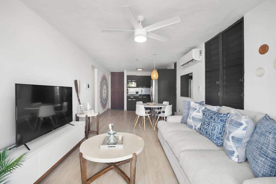 Relax and unwind with a movie on the plush sofa in our cozy living area.