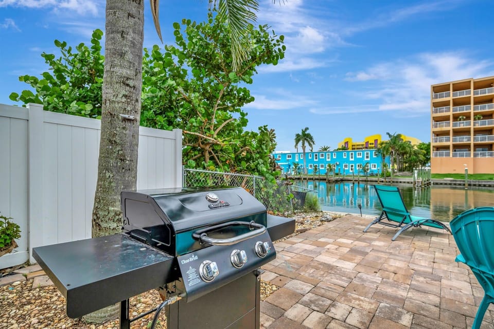 Waterside relaxation & BBQ nights. Your perfect patio awaits!