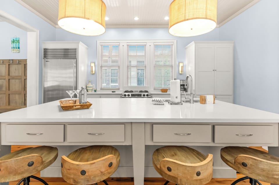 Kitchen with large island allows multiple people to cook together