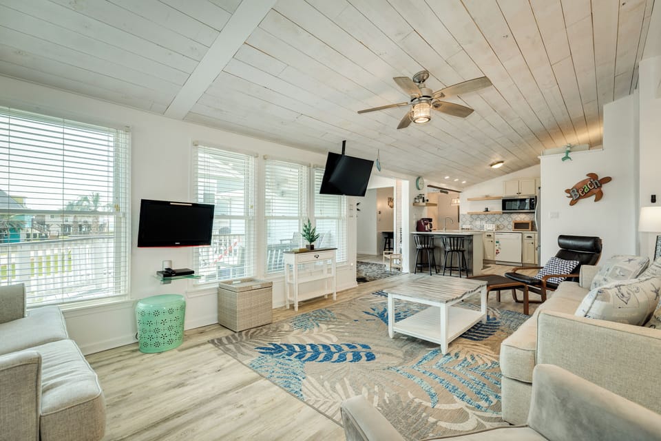 Bright and airy living area with wall of windows