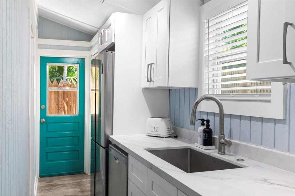 Stainless refrigerator and dishwasher.