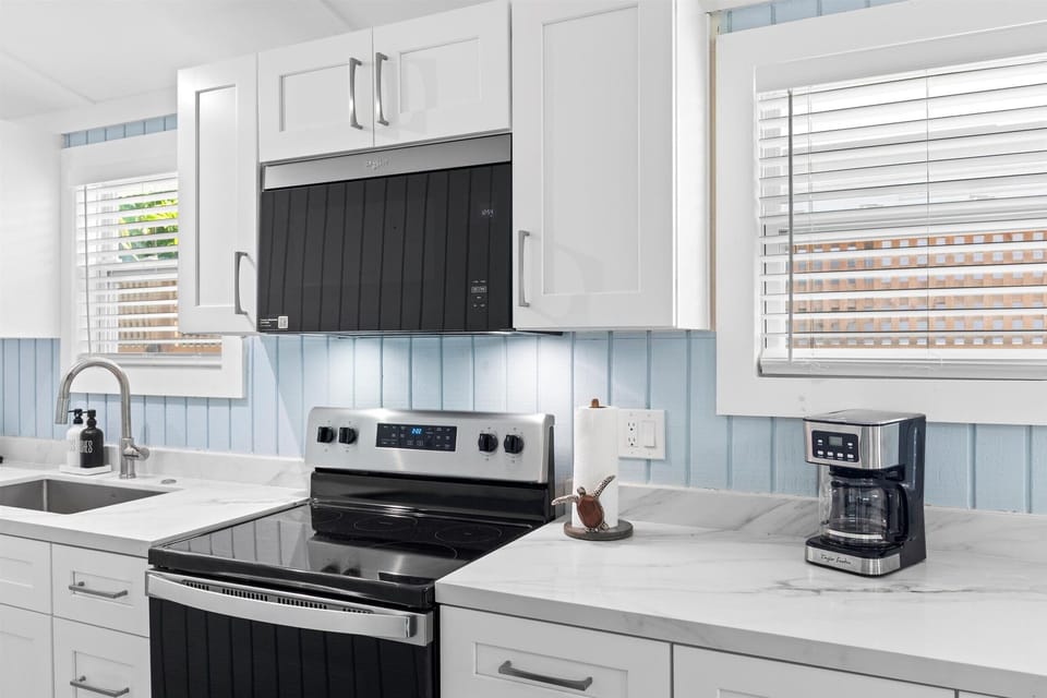All new stainless steel appliances and quartz counter tops.