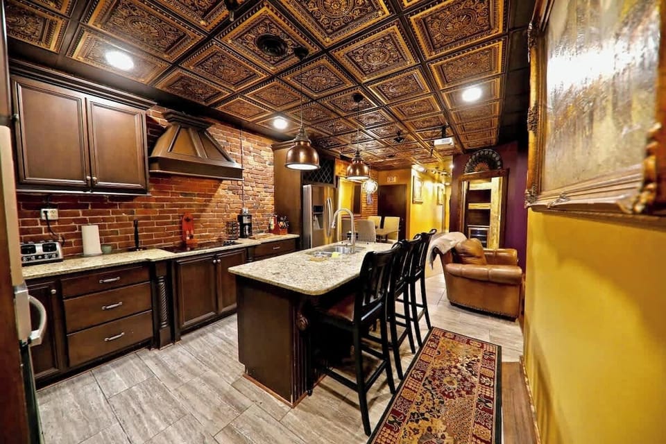 Black, purple and gold are our featured colors here. Every detail and every piece of decor carefully chosen to accent the vibrant colors.