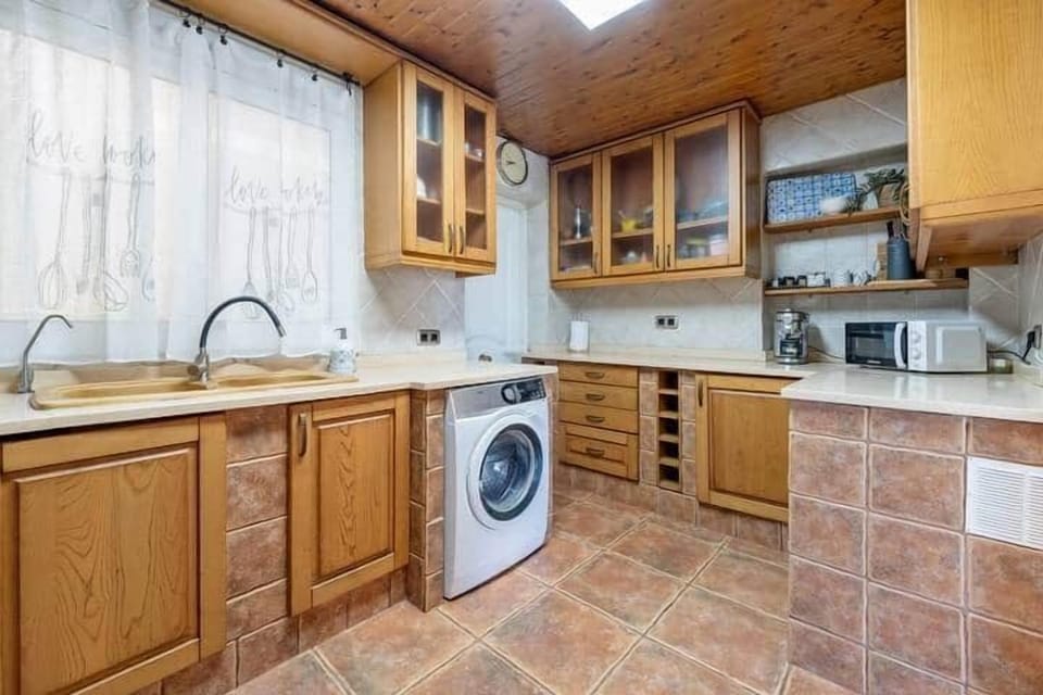 Rustic Kitchen with Wooden Cabinets