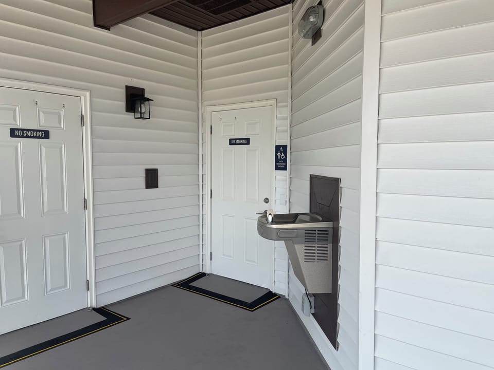 Restrooms with showers near 2nd pool