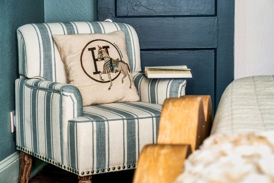 Featured in Charlotte Magazine: our Wesley Heights retreat, thoughtfully designed by Laura Roach, blends bold style, comfort, and character in every detail.