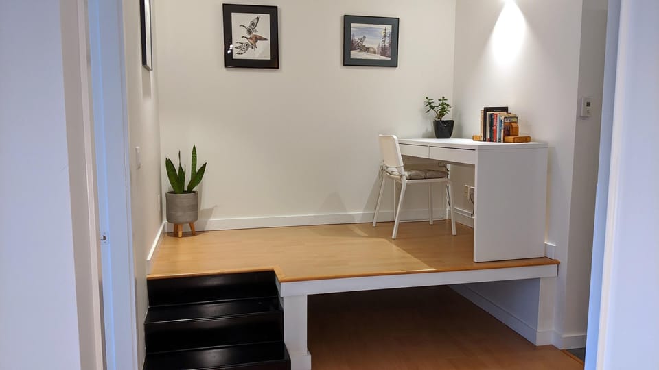 Elevated perspective of the home office space integrated into the layout.