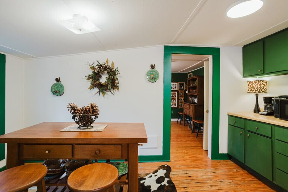 Full kitchen | Appliances | Cozy Dining Table in Center | Open Layout with Easy Flow to Living Area