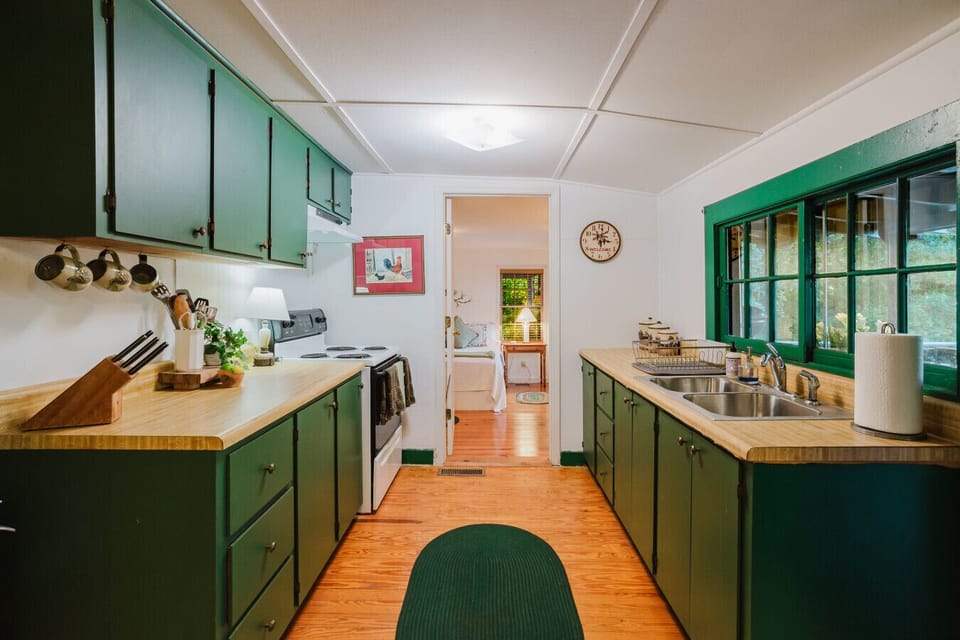 Full kitchen | Appliances | Cozy Dining Table in Center | Open Layout with Easy Flow to Living Area