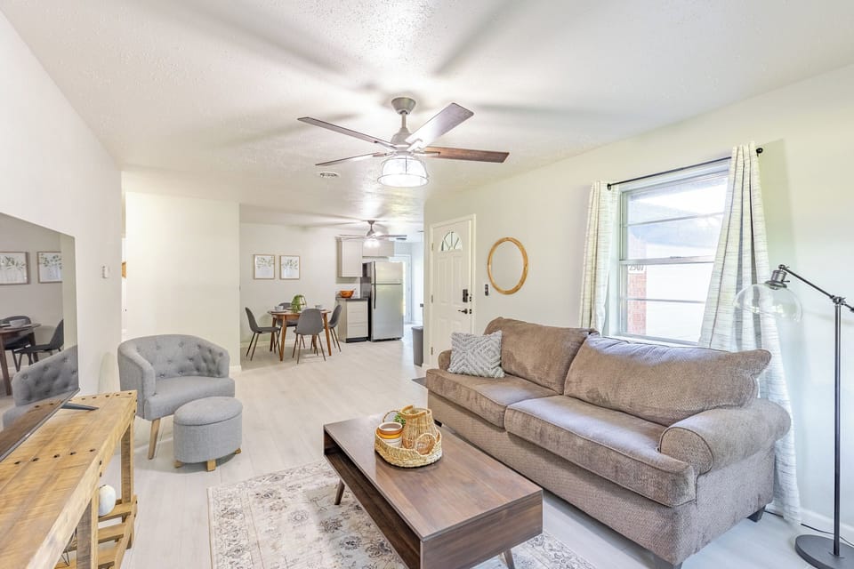 Inviting living room with smart TV and plenty of comfort.