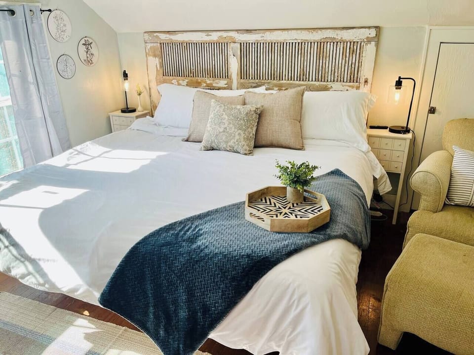 Unwind in your private retreat bedroom with a plush king bed.