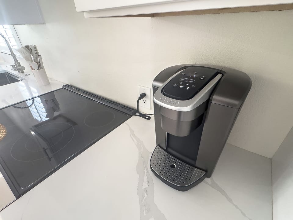 Keurig in the kitchen area.