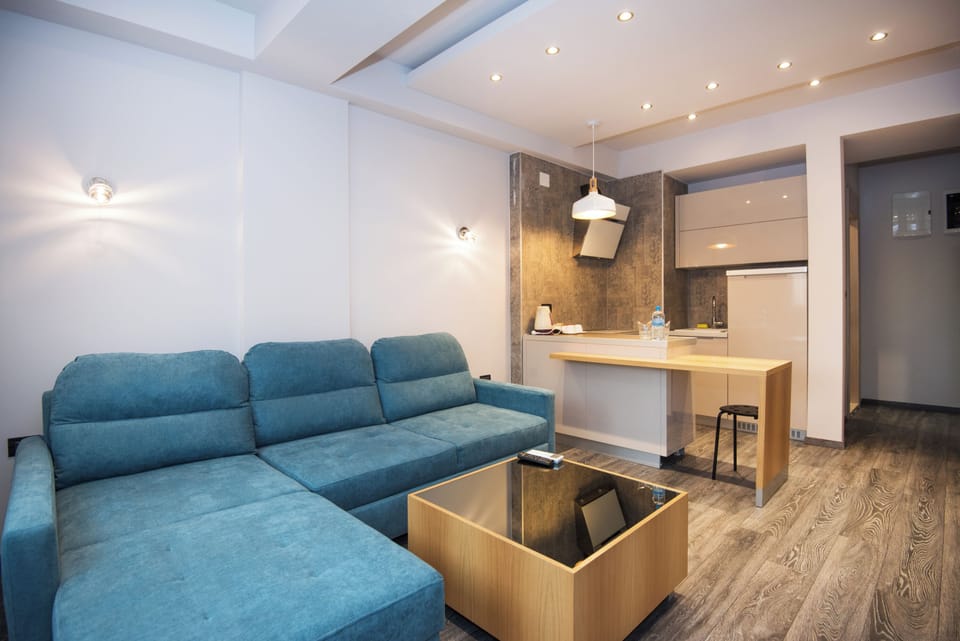 Living area. Exact unit will be assigned upon arrival. Views, colors, and decor may vary.