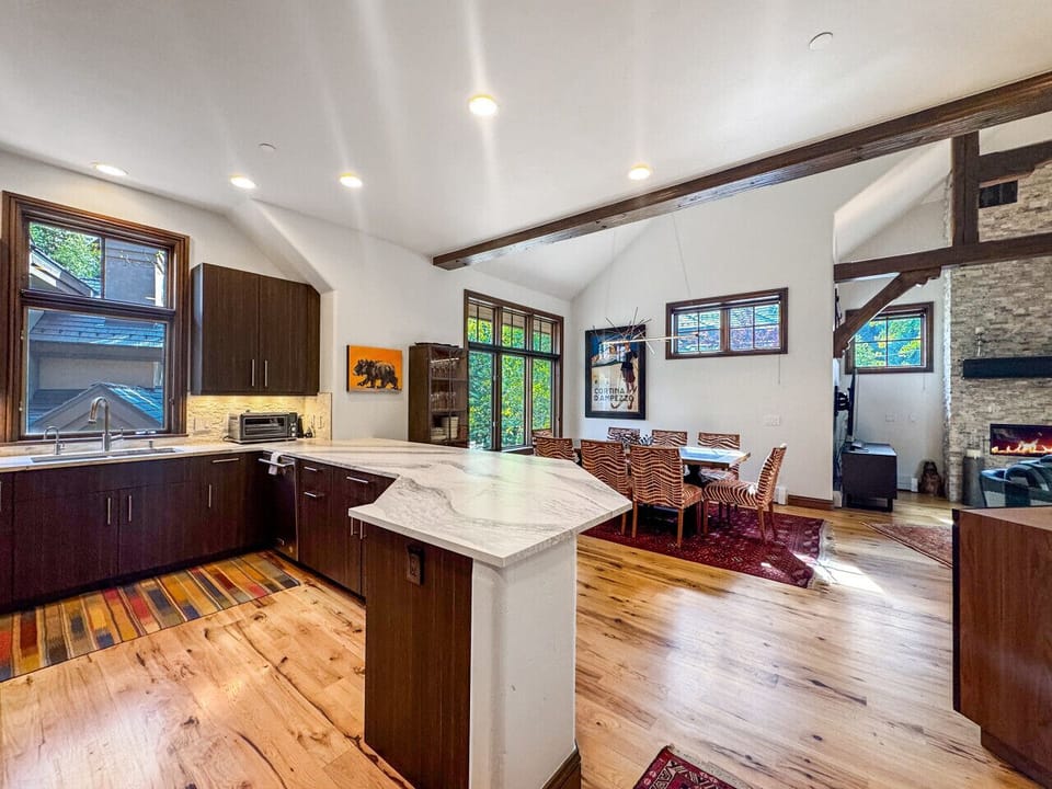 From this vantage point, see how seamlessly the kitchen flows into dining and living spaces. The open design keeps the chef connected to all conversations - perfect for entertaining where cooking becomes part of the shared experience