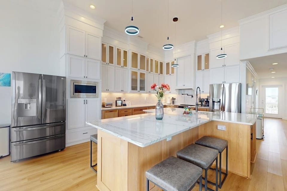 Island Seating for 6+. 2 Full-Size Refrigerators.