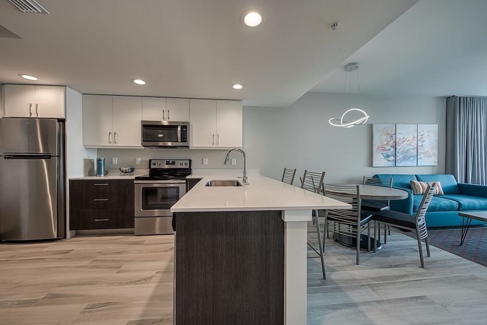 Cook together in the sleek kitchen with generous island seating.