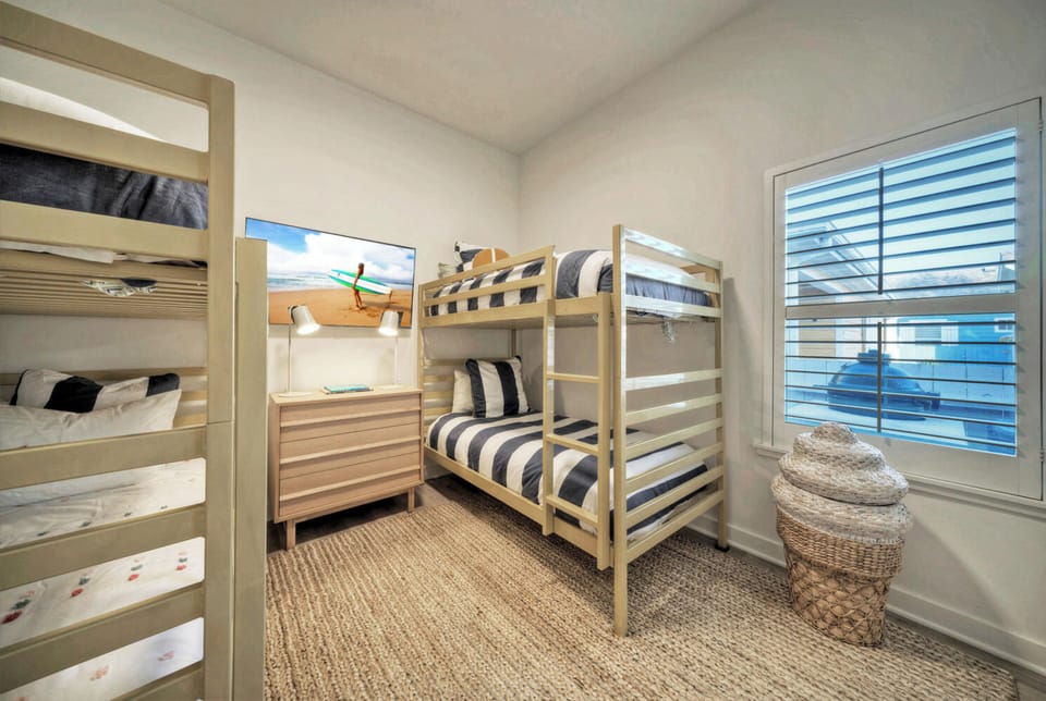 Bedroom 3 features two twin bunk beds. (Clamshell Cottage)