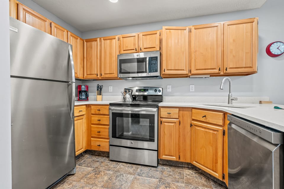 Plenty of counterspace for meal prep and cabinets for storage.