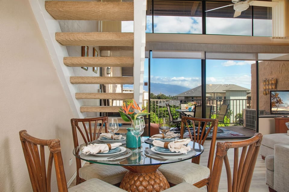 First unit. Dining area with table and 4 chairs perfect for shared meals.