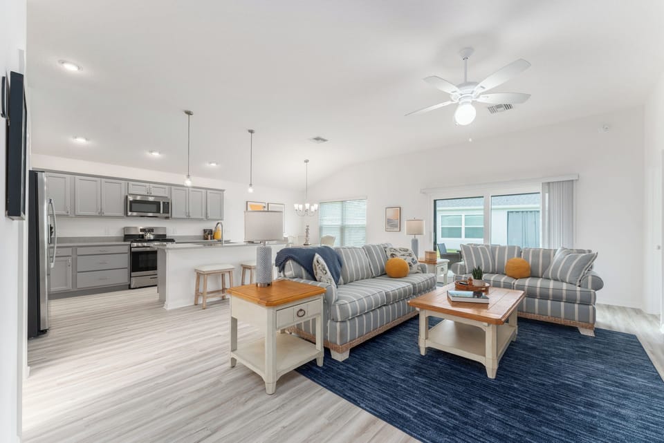 Airy, Open Concept: Living Room, Kitchen and Dining